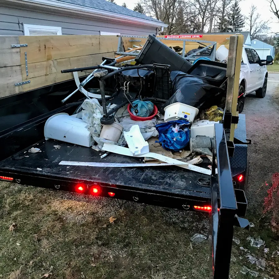 Roll-off dumpster delivered to a residential driveway in Margate