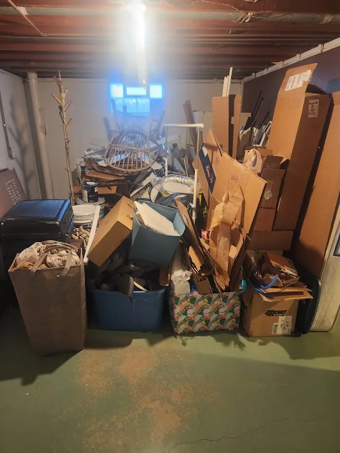 Roll-off dumpster container at job site for Yard Waste Dumpster Rental in Margate